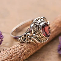 Garnet cocktail ring, 'Romantic Traditions' - Traditional Style Silver and Garnet India Cocktail Ring
