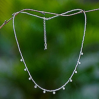 Sterling silver charm necklace, 'Petite Fleur' - Hand Made Sterling Silver Floral Charm Necklace